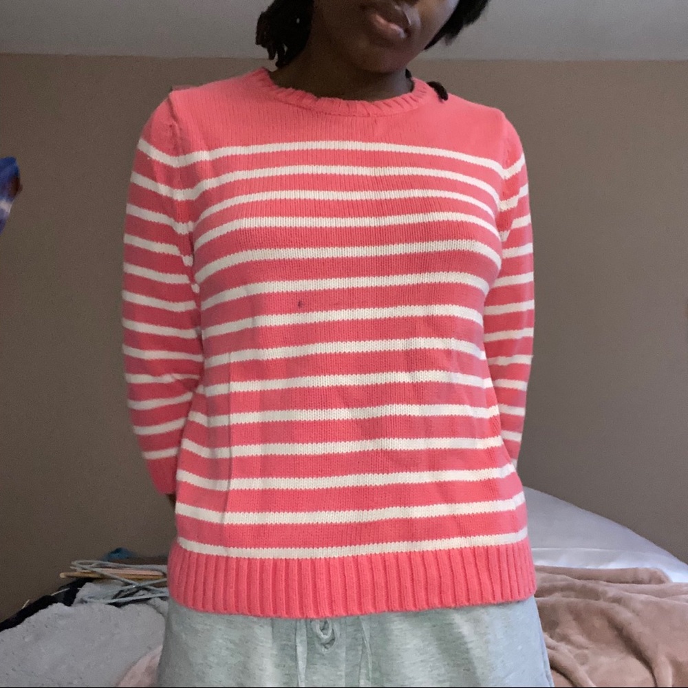 Salmon and white sweater